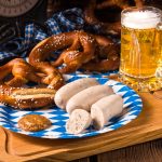 Bavarian sausage with pretzels, mustard and beer